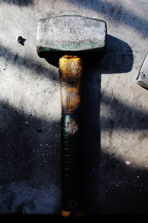 An ancient-looking hammer, profile picture of Ben, Designer of Hammerburg Studios